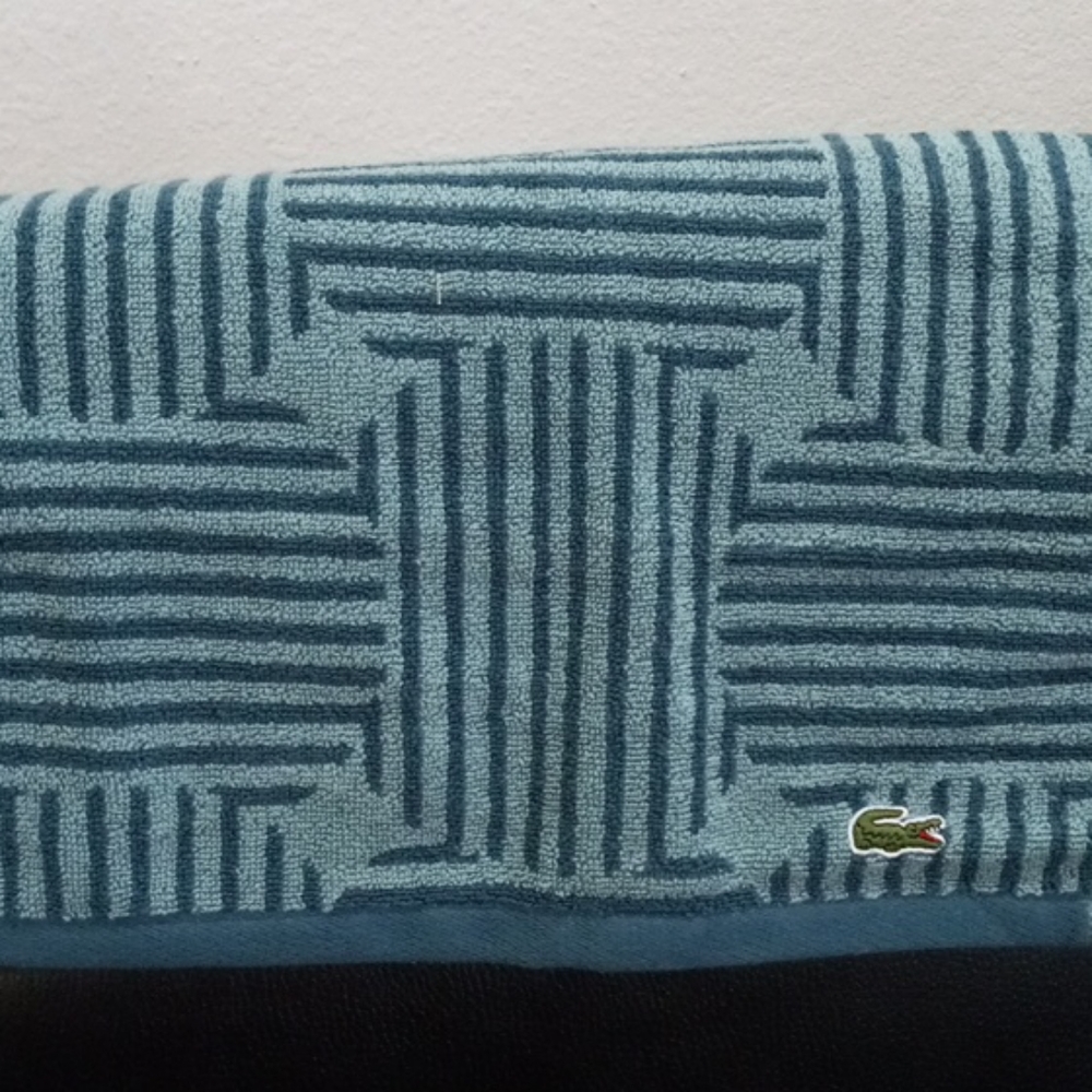 A soft cotton washcloth from Lacoste